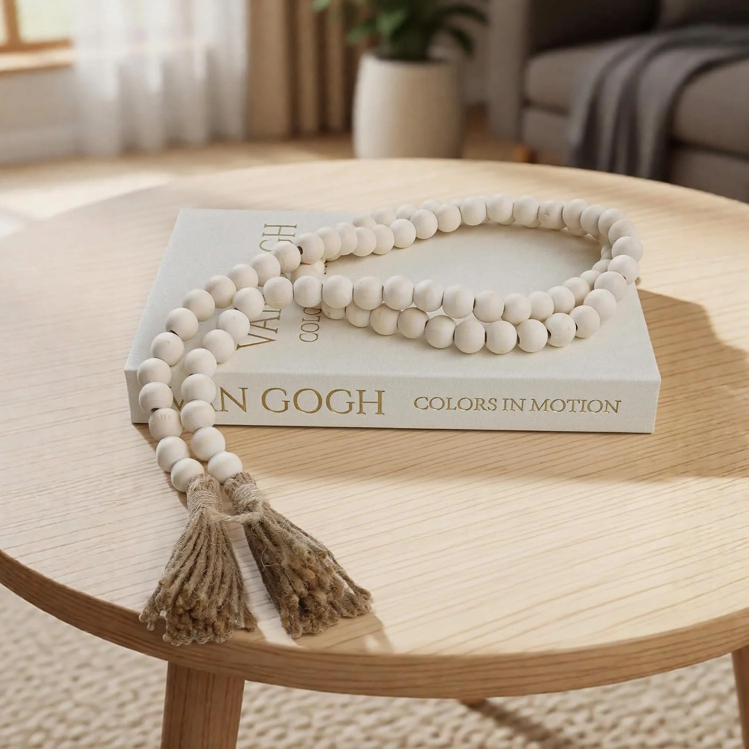 Wood bead garland with tassels, Natural Wood: garland with a book stack