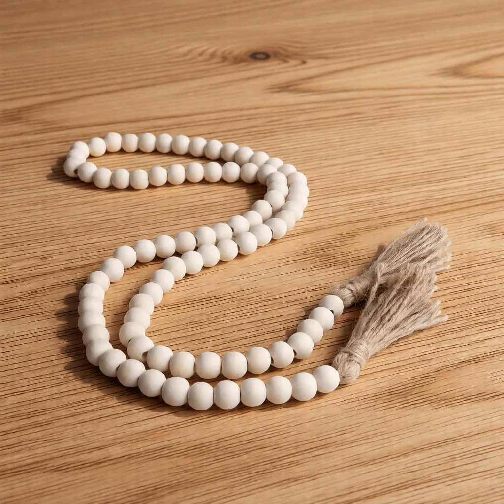 Wood bead garland with tassels, Natural Wood: beads arranged in a loose curve