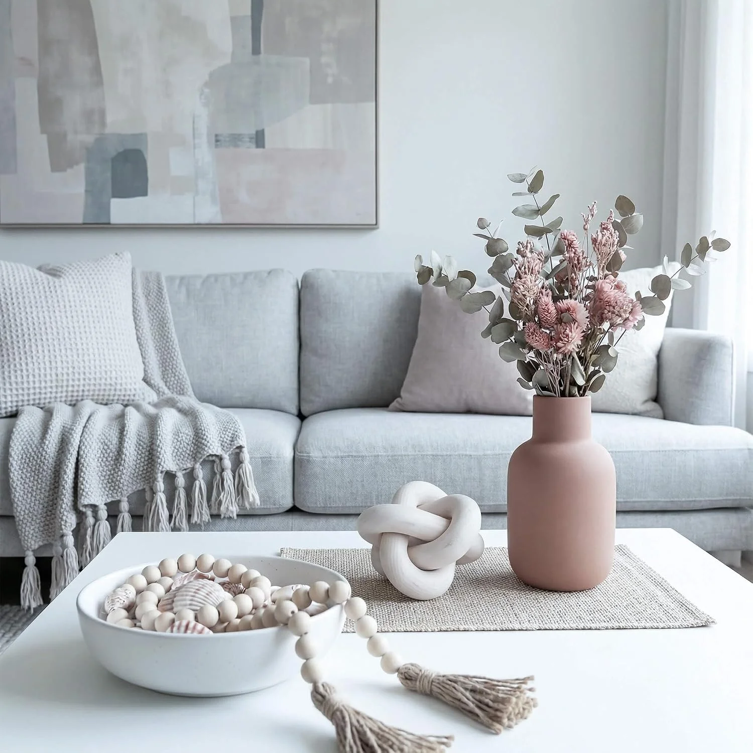 White wood knot sculpture, White: living-room styling arrangement