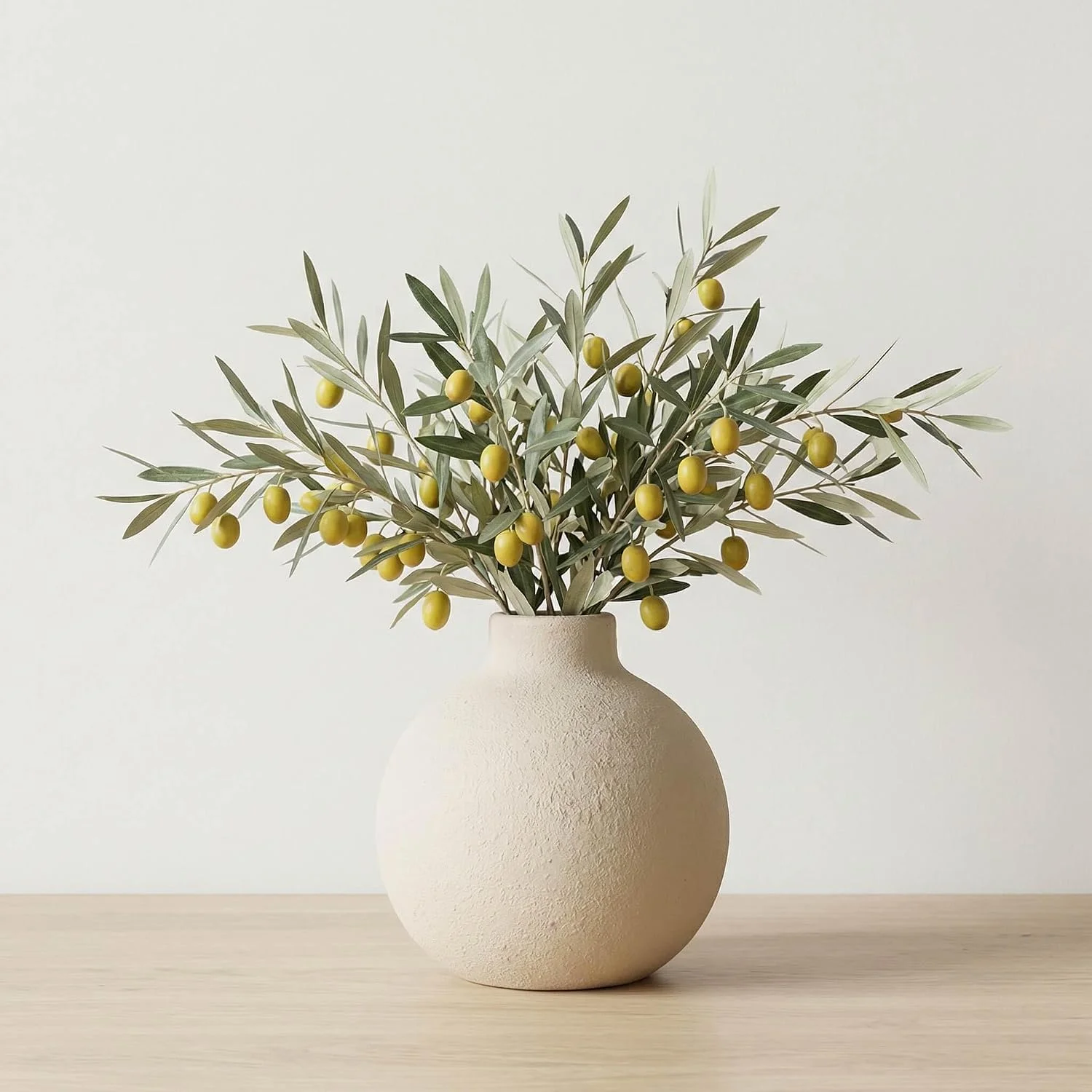 Rustic round ceramic vase, Terracotta: round vase with styled foliage