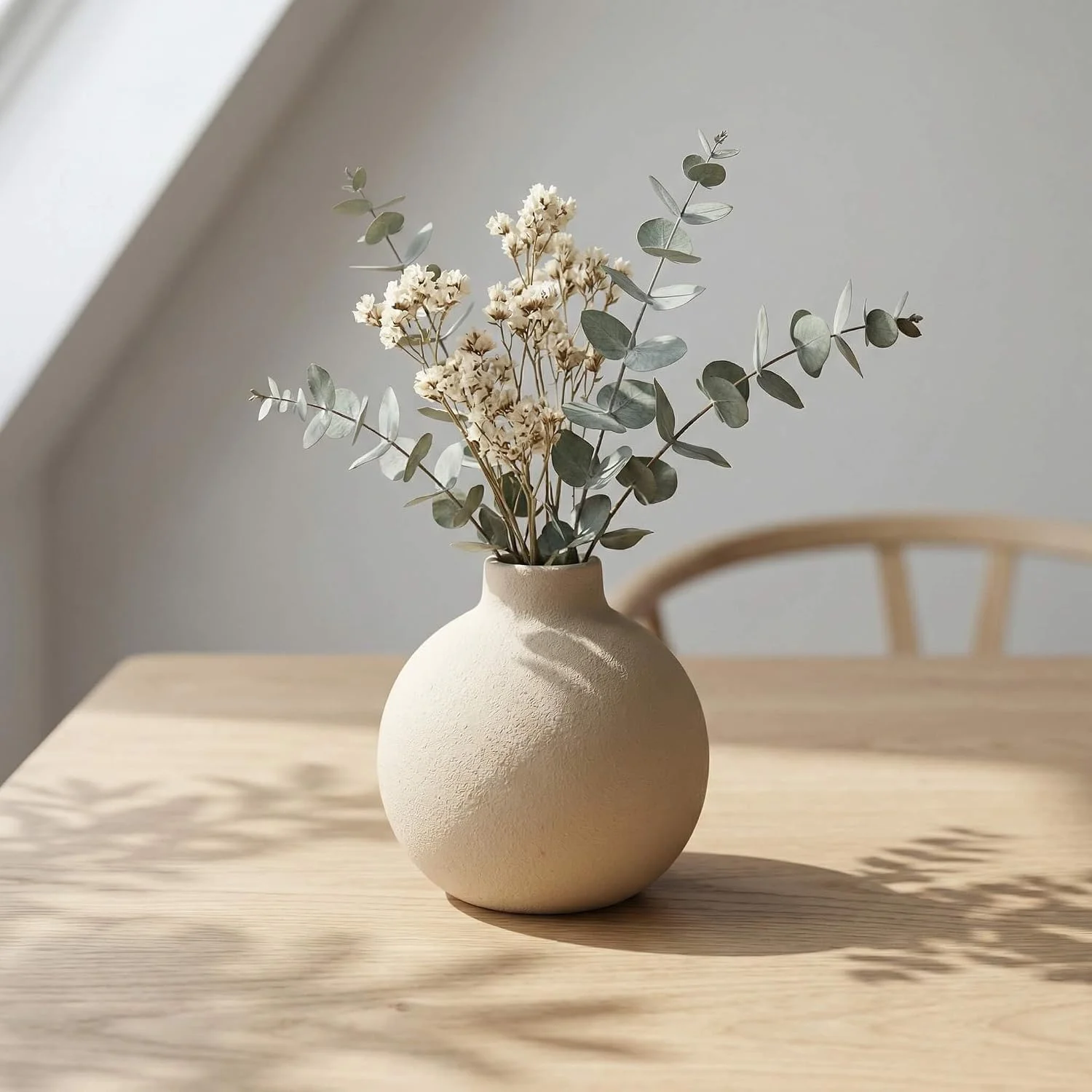 Rustic round ceramic vase, Terracotta: vase near a window