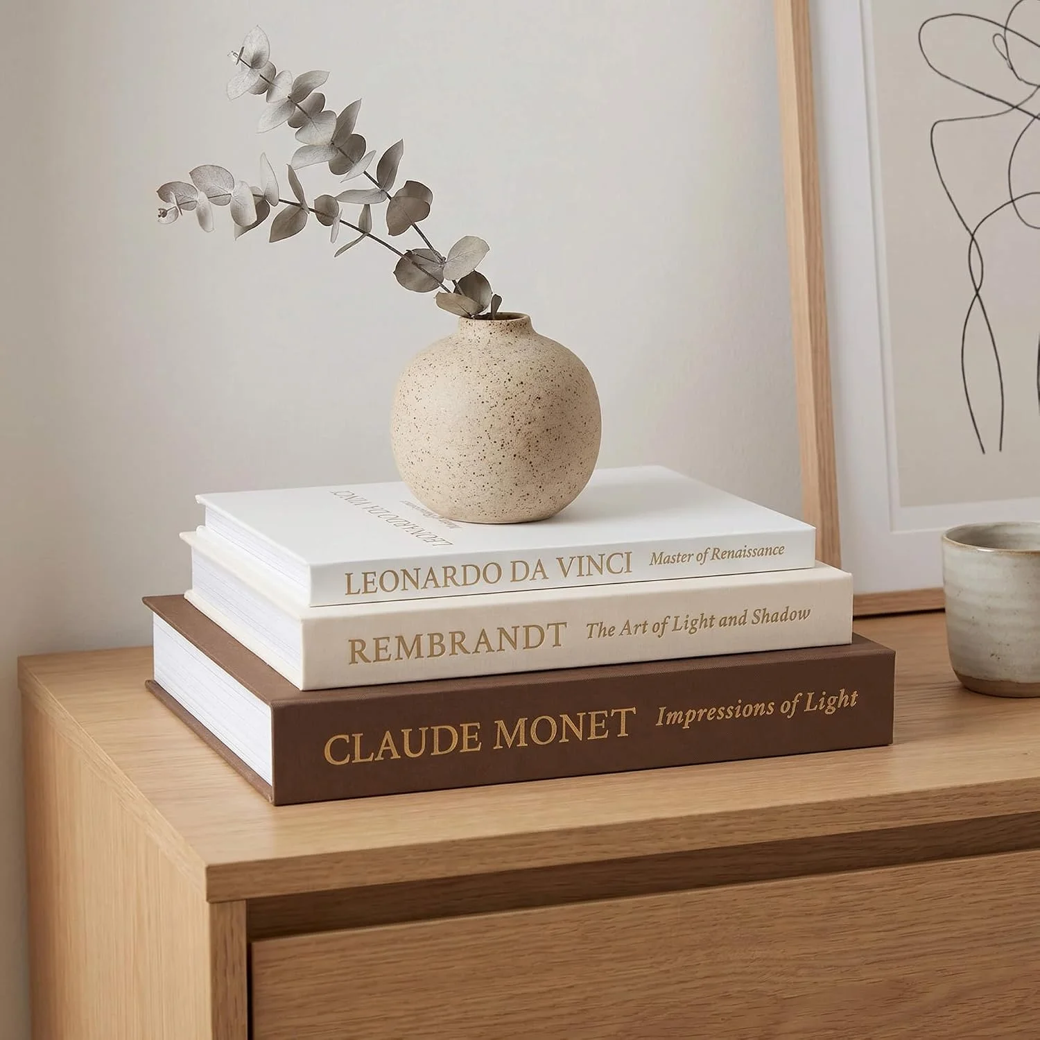 Artist trio linen storage books, Brown-Beige-White: three-book stack on a console