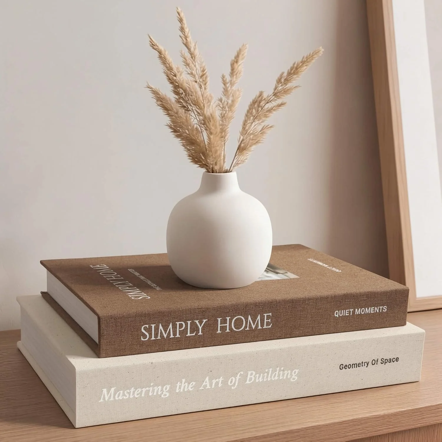 Simply Home linen storage books, beige, brown: stack beneath a vase
